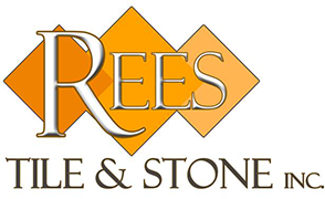 A logo of rees stone and tile